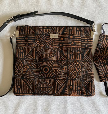 Leather shoulder bag/clutch  featuring Indigenous textiles Image