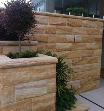 Natural stone wall cladding - Rockface Sandstone walling Image